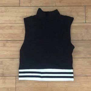 Cropped sleeveless turtleneck